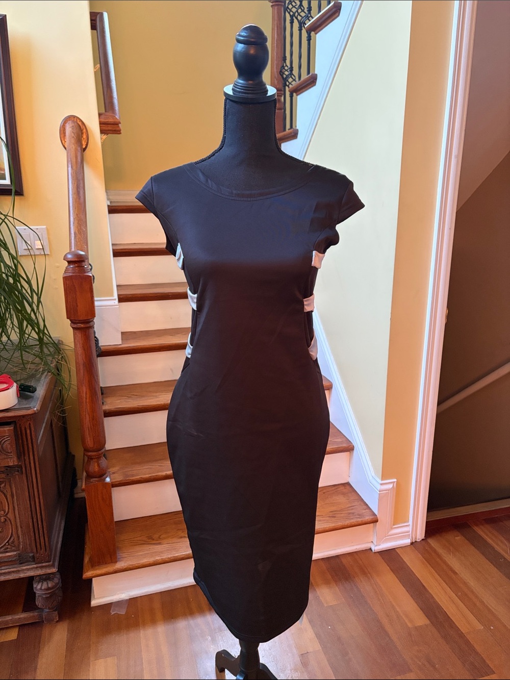 Sleek Black Midi Sheath Dress with Side Cutouts
